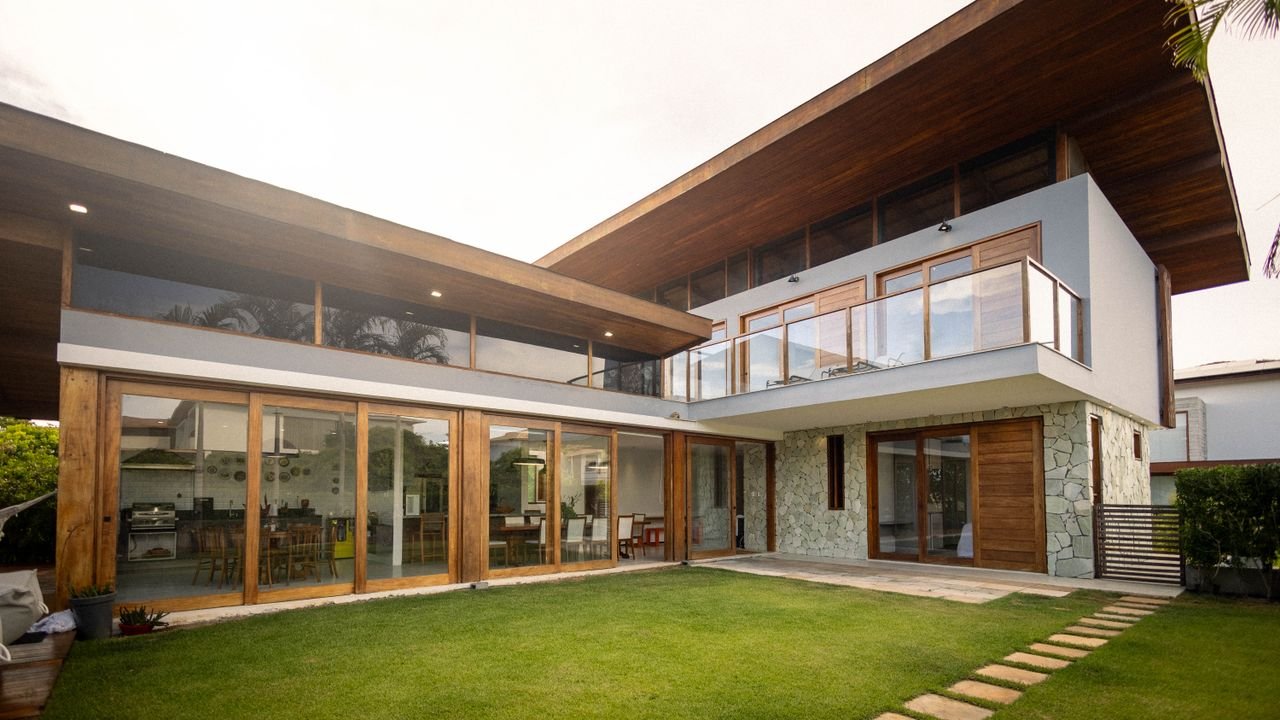 Professional luxury villa renovation service showing a modern interior and exterior home remodeling project.