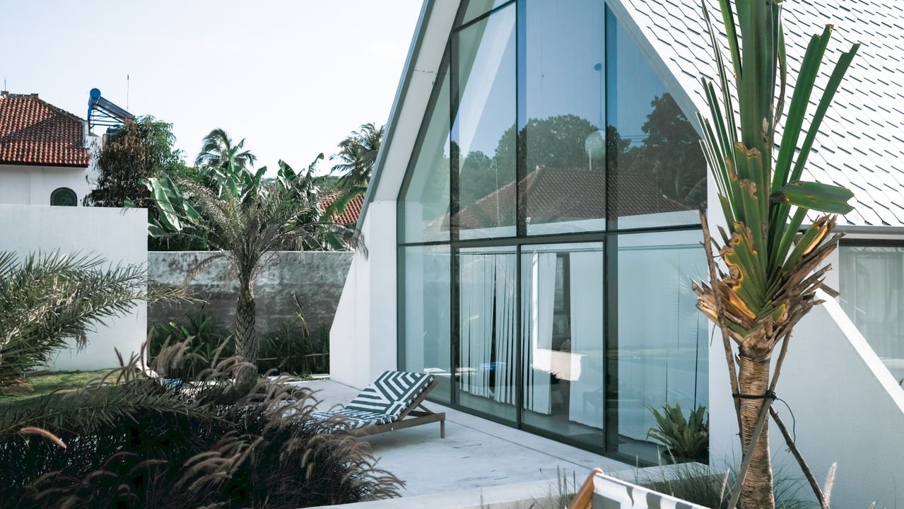 Expert contractors working on a high-end residential villa upgrade, flooring, and structural remodeling.